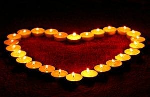 Picture of candles shaped like heart.